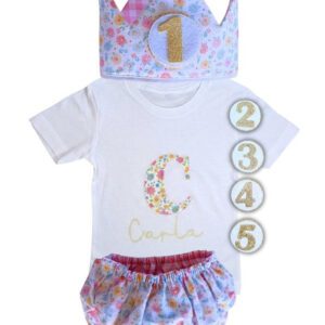 Pack de cumpleaños con corona, cubrepañal y camiseta flores